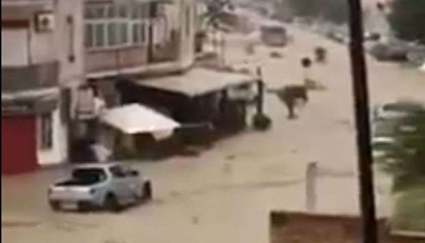 A screen shot from a video posted on Twitter shows a flooded area in Sicily. 