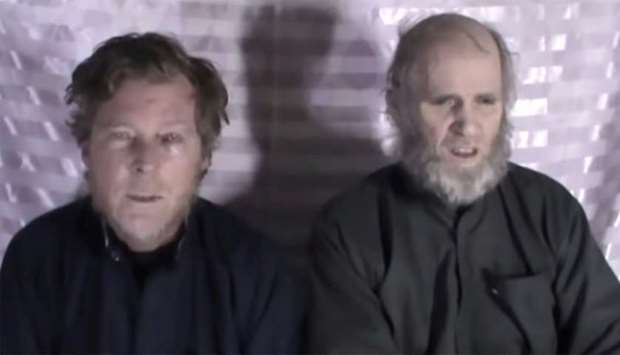 Timothy Weeks and Kevin King speak to the camera while kept hostage by Taliban insurgents in an unkn