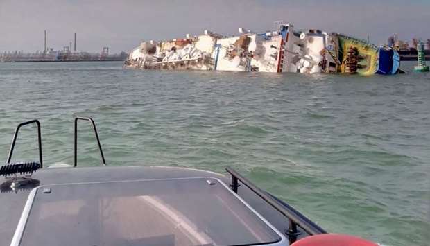 The capsized livestock transpot vessel, in the ,Midia, Black Sea harbour near Constanta yesterday.