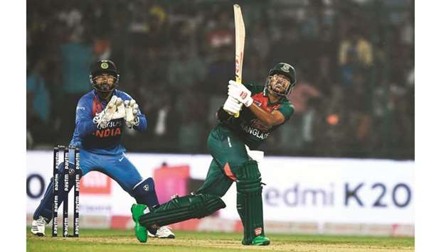 Bangladeshu2019s Soumya Sarkar plays a shot during the first T20 match against India in New Delhi yesterday. (AFP)