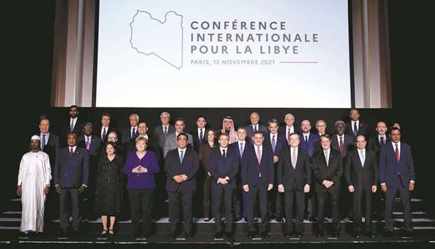 French President Emmanuel Macron along with International leaders pose for a family photo during the International Conference on Libya at La Maison de la Chimie in Paris, yesterday.