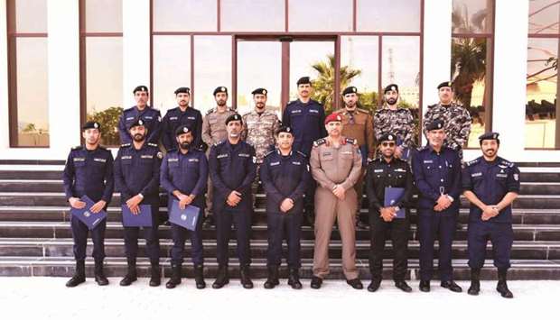 Senior officials from the General Directorate of Industrial Security with the course participants.