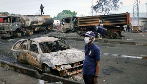 The majority of the victims were street vendors and motorcyclists, many of whom were caught in the blaze while trying to retrieve fuel leaking from the tanker before it ignited. (AFP)