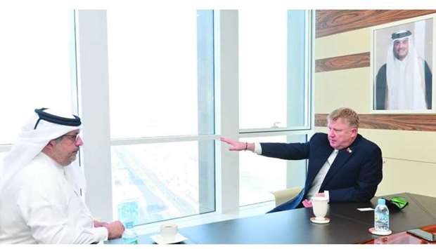 Gulf Times Editor-in-Chief Faisal Abdulhameed al-Mudahka in a meeting with QTerminals Chief Executive Neville Bissett.