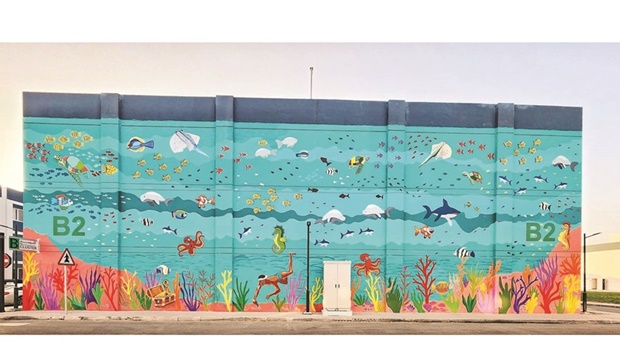 The outdoor wall mural embellishes the newly-built residential city in Al Wakrah, as it prepares to welcome fans and volunteers during the FIFA World Cup Qatar 2022.