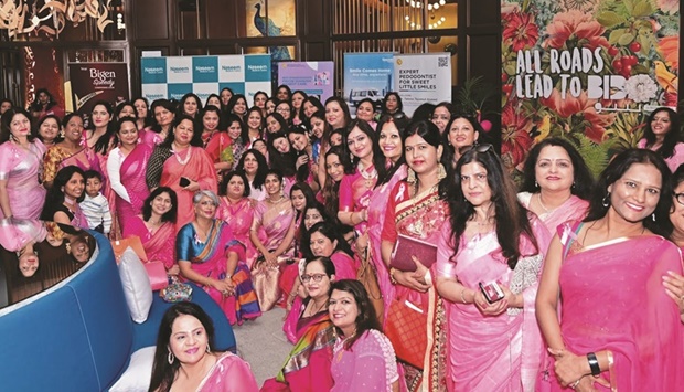 In recognition of breast cancer warriors 75 ladies wore pink sarees with the ribbons and real life experiences were shared.