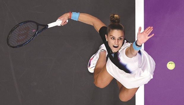 Maria Sakkari of Greece serves against Aryna Sabalenka of Belarus in their Group Stage match during the 2022 WTA Finals at Dickies Arena in Fort Worth, Texas. (AFP)