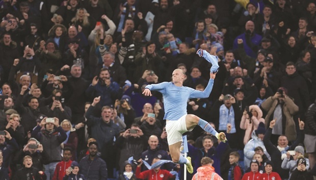 Manchester Cityu2019s Erling Braut Haaland celebrates after scoring against Fulham in the Premier League at the Etihad Stadium in Manchester yesterday. (Reuters)