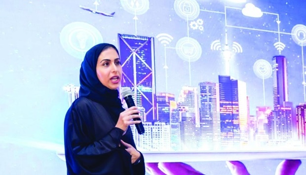 Mariam Ahmed al-Khal, senior director ICT Product Development at Ooredoo, delivering a speech.
