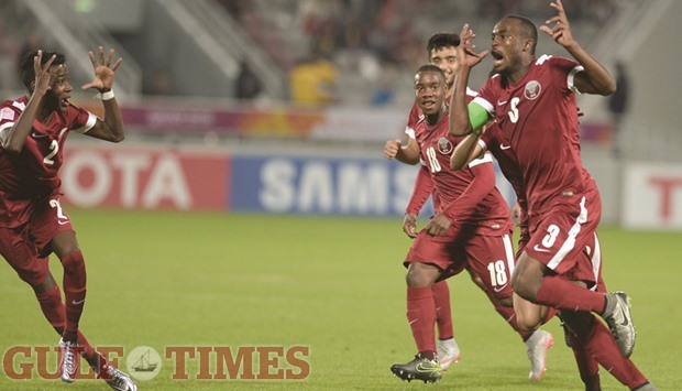 Qatar skipper Abdelkarim Hassan (left) celebrates after scoring the second goal yesterday. PICTURES: Mamdouh