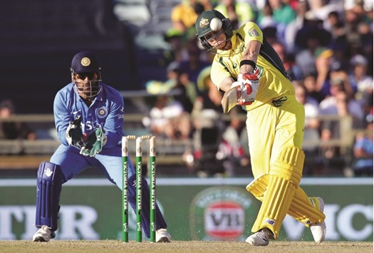 Dhoni keeps wickets as Steve Smith bats on Tuesday.