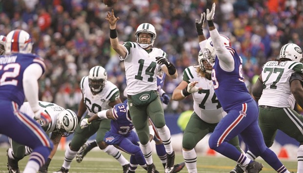 Buffalo Bills defensive tackle Marcell Dareus, center, passes