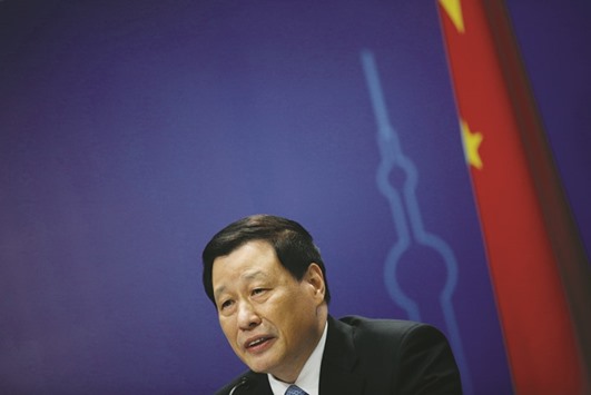 Mayor Ying Yong attends a news conference after the annual session of the local parliament in Shanghai, China.