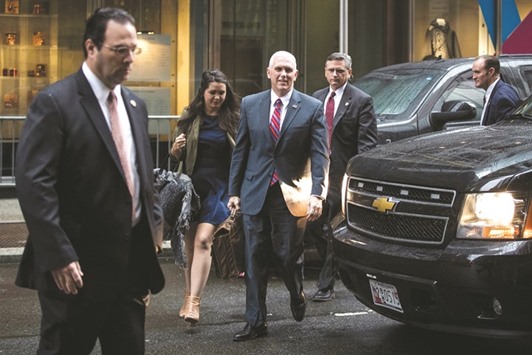 Vice President-elect Mike Pence arrives at Trump Tower in New York city yesterday. President-elect Donald Trump and his transition team are in the process of filling cabinet and other high level positions for the new administration.