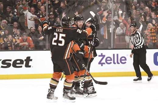 Ducks' Adam Henrique returns after taking puck to the face