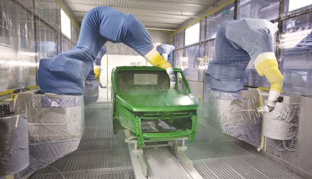 A coat of paint is applied to the body of a truck by robotic sprayers in Nizhny Novgorod, Russia. While technological advances in automation are starting to handle thousands of routine tasks and will eliminate many low-skill jobs in advanced economies and developing countries, itu2019s also creating opportunities for different, more productive and more creative jobs, the World Bank says in its report.