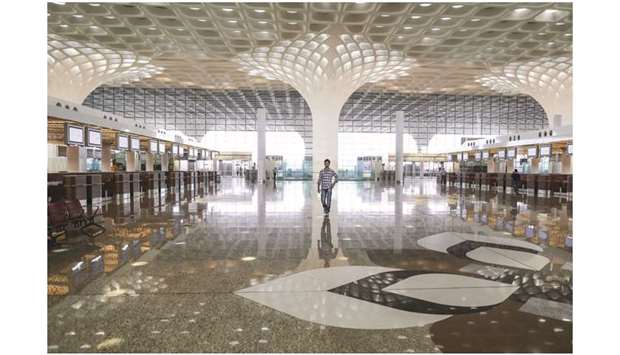 A man walks inside the Chhatrapati Shivaji International Airport in Mumbai. Many say 2020 may throw up challenges to the aviation industry in terms of airport capacity and skills shortage around the globe. Capacity is critical at numerous large airports around the globe.