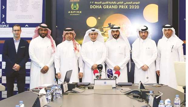 Qatar Fencing Federation and Aspire Academy officials pose on the eve of the Qatar Fencing Grand Prix.