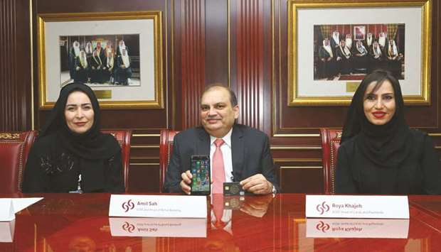 Commercial Bank EGM and head of Retail Banking Amit Sah (centre) during the media roundtable held yesterday. Looking on are (from left) Abeer Marwan al-Kalla, head of Corporate Communications & CSR, and Commercial Bank AGM, head of Cards and Payments Roya Khajeh. PICTURE: Jayan Orma