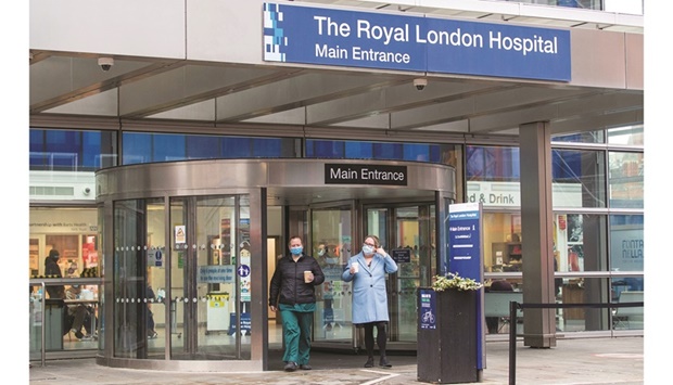 Hospital staff members are seen at the Royal London Hospital, in London.