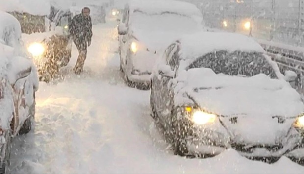 Snowfall began late last week and picked up in recent days in the city of 16 million people. Footage from the airport, among the world's largest, showed runways covered in a thick blanket of snow with aircraft and vehicles barely visible.