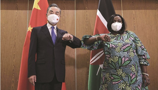 Chinau2019s Foreign Minister Wang Yi (left) is received by his Kenyan counterpart, Raychelle Omamo, at the Sarova Whitesands Hotel where they met for a bilateral meeting between Kenyan and Chinese officials in the Kenyan coastal city of Mombasa yesterday. China is Africau2019s largest trading partner, with direct trade worth over $200bn (u20ac177bn) in 2019, according to official Chinese figures.