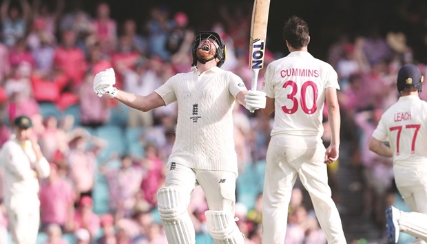 Englandu2019s Jonny Bairstow celebrates after reaching to his century on day three of the fourth Ashes Test against Australia at the Sydney Cricket Ground. (AFP)