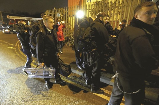 Riot police arrive at the BMP Birmingham prison, run by security firm G4S.