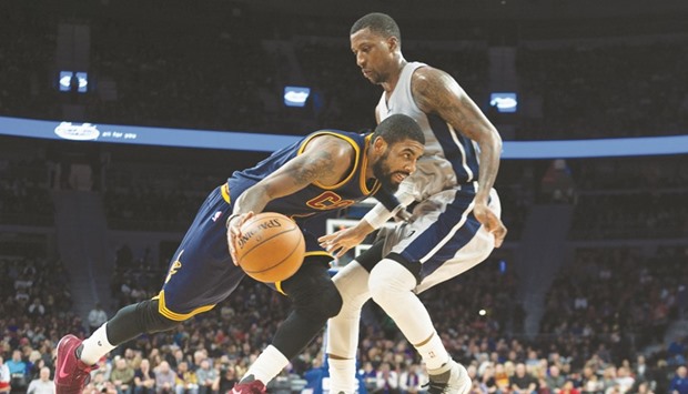 Cleveland Cavaliersu2019 Kyrie Irving (left) tries to dribble past Detroit Pistonsu2019 Kentavious Caldwell-Pope. (Tim Fuller-USA TODAY Sports)