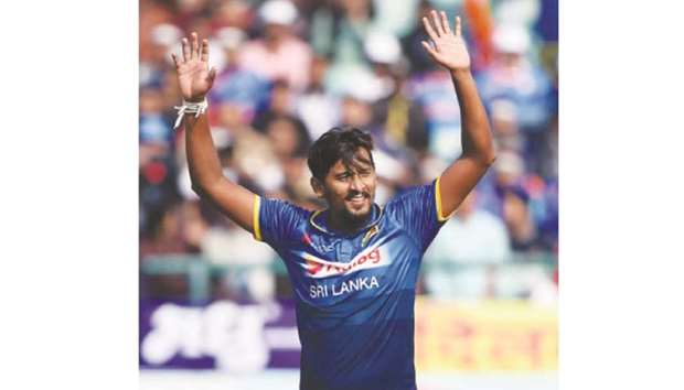 Sri Lankau2019s Suranga Lakmal celebrates after taking a wicket during the first one-day international against India at the Himachal Pradesh Cricket Association Stadium in Dharamshala yesterday. (AFP)