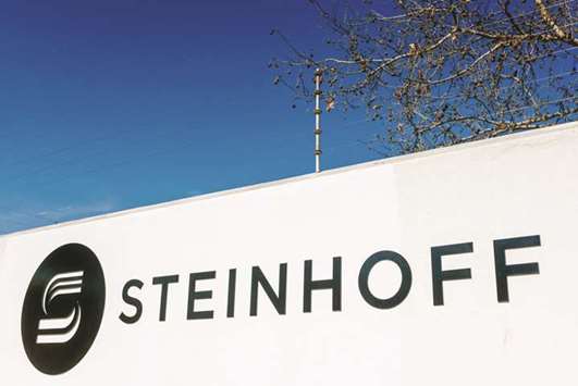 A Steinhoff International logo sits on display outside the companyu2019s offices in Stellenbosch, South Africa.  Fears around Steinhoffu2019s accounting irregularities have cut the share price by more than 90% as investors baulked at a lack of further information and billionaire chairman Christo Wiese also quit. Steinhoff is being investigated by regulators in Germany, South Africa and the Netherlands and faces a spate of lawsuits in Europe.