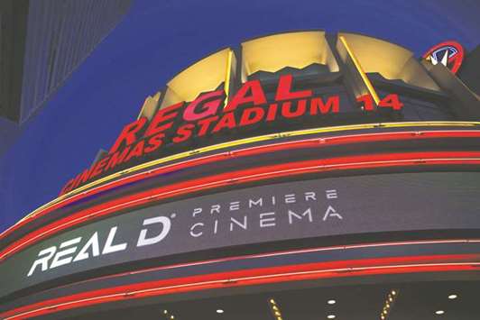 RealD signage is displayed outside a Regal Cinemas movie theatre in Los Angeles. With Regal deal, Cineworld will gain opportunities for growth outside Britain, where consumer spending is falling ahead of the countryu2019s exit from the European Union.