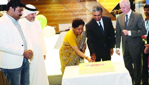 Indian ambassador to Qatar P Kumaran and other dignitaries, guests at the cake-cutting ceremony