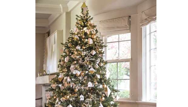 DECOR: Spiders and spider webs are also often used as Christmas tree decorations to bring luck and prosperity.