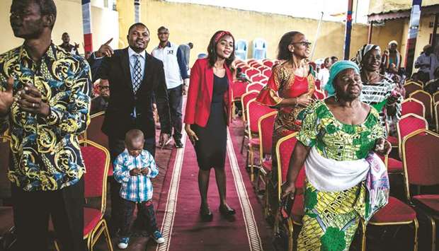 Congolese attend a prayer session at a church in Kinshasa yesterday, seven days ahead of the Democratic Republic of the Congou2019s delayed elections.