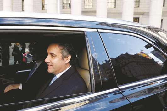 President Donald Trumpu2019s former lawyer Michael Cohen exits Federal Court after entering a guilty plea in Manhattan on Thursday.