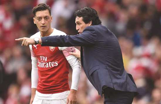 Arsenal: Treat Henrikh Mkhitaryan like Mesut Ozil's equal