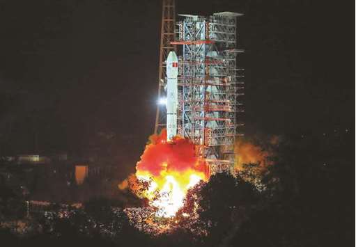 A Long March 3B rocket lifts off from the Xichang launch centre in Xichang in Chinau2019s southwestern Sichuan province early yesterday.