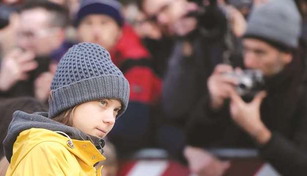 Thunberg arrives to takes part at a Friday for Future strike on climate emergency, in Turin.