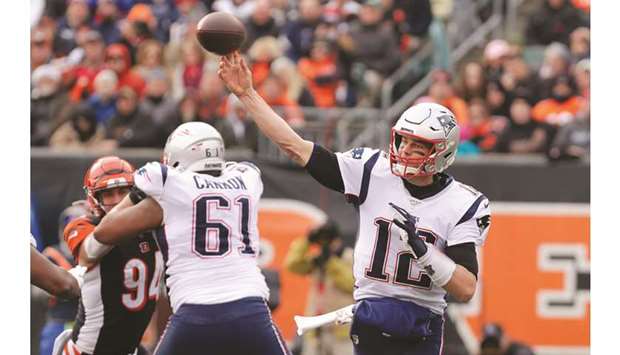 Brady throws 2 TDs, Patriots beat Bengals to clinch playoffs