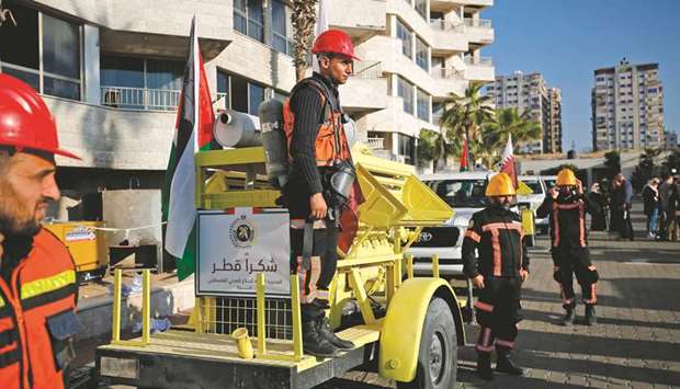 The vehicles, donated by Qatar, to the civil defence and fire brigade on display in Gaza City during a visit from the Qatar envoy to Gaza yesterday.