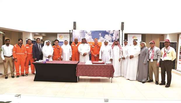 QSTec leaders and some of the staff during National Day celebrations.