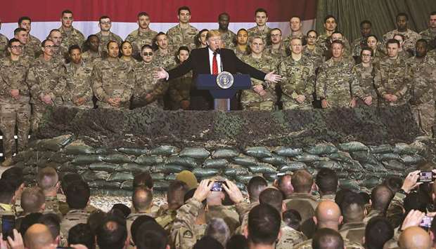 In this file photo taken on November 28, Trump speaks to the troops during a surprise Thanksgiving day visit at Bagram Air Field, in Afghanistan. The president has shattered norms and niceties on the world stage in his nearly three years in office. Entering an election year, Trump is unlikely to slow down as he seeks what has largely eluded him: a headline-grabbing victory.