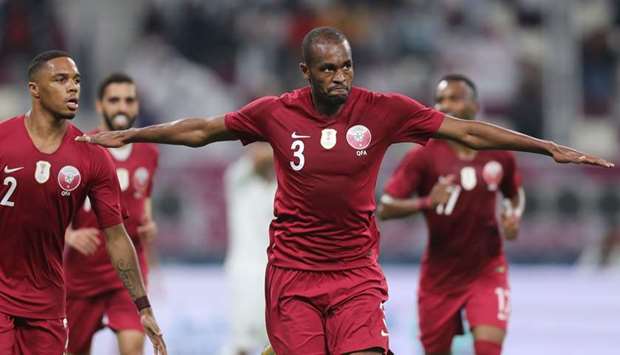 Qatar's defender Abdelkarim Hassan (C) celebrates after scoring during the 24th Arabian Gulf Cup Group A football match between Yemen and Qatar at the Khalifa International Stadium, Doha on November 29. AFP/KARIM JAAFAR