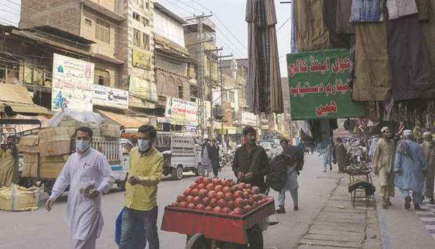 Residents walk through the oldest Qissa Khawani or u2018storytellers bazaaru2019 in Peshawar.