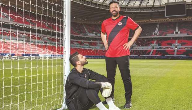 Al Rayyan goalkeeper Fahad Younes Ahmed (left) with his father Younes, who also played for the club and Qatar.