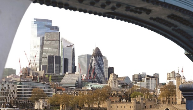 Skyscrapers and buildings seen on the City of London skyline. The European Union should take steps to reduce its dependence on two major London-based clearinghouses given their potential threat to financial stability, the blocu2019s markets watchdog said.