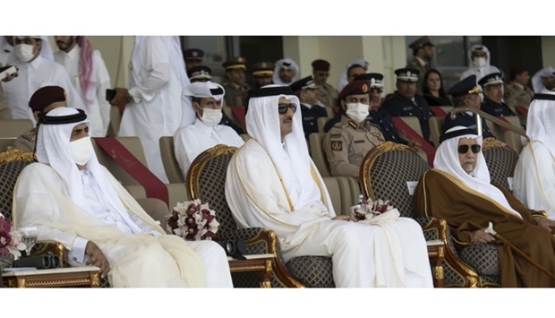 His Highness the Amir Sheikh Tamim bin Hamad al-Thani, His Highness the Father Amir Sheikh Hamad bin Khalifa al-Thani and a number of dignitaries attended the National Day Parade at Doha Corniche Saturday