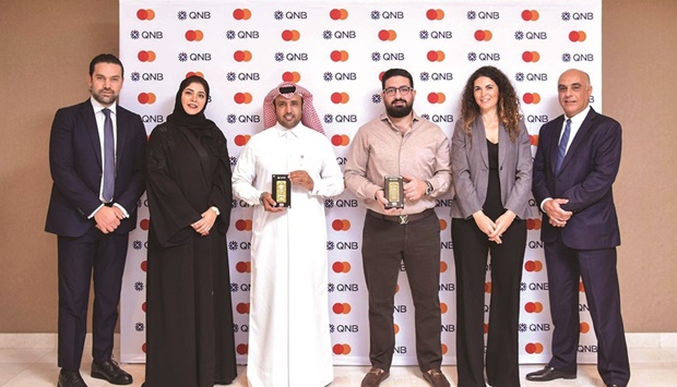 Winners of the mega campaign with QNB, Mastercard officials