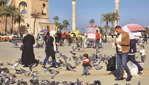 People visit the old town of the Libyan capital Tripoli, yesterday.